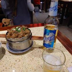 Beef ,rice and beer for grand price of £3.51,(32 CYN)