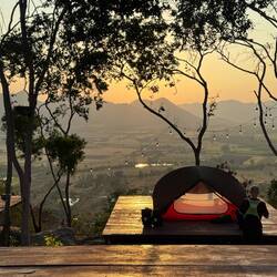 We pitch our little tent up on one of the campsite's raised platforms. The view is stunning.