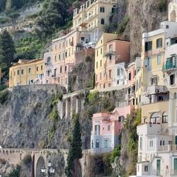 Intersection buildings built next to the vertical cliff face