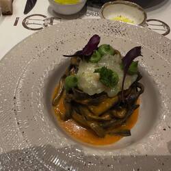 My squid ink pasta and raw linguine dinner in Rome.
