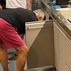Installing towel holders in the kitchen