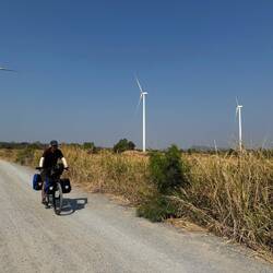 Leaving Divine Mountain campsite and its high ridge lined with turbines.
