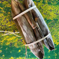 And she treated us to these little banana leaf wrapped parcels of glutinous rice.