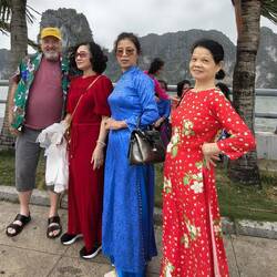 Ladies wearing colorful Vietnamese ao dai