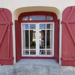 Looking into the living room and right through the French doors to our dependence in the garden