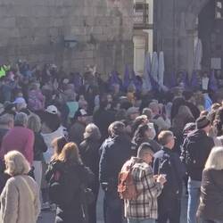 The sermon done, the procession heads off through the streets of town.