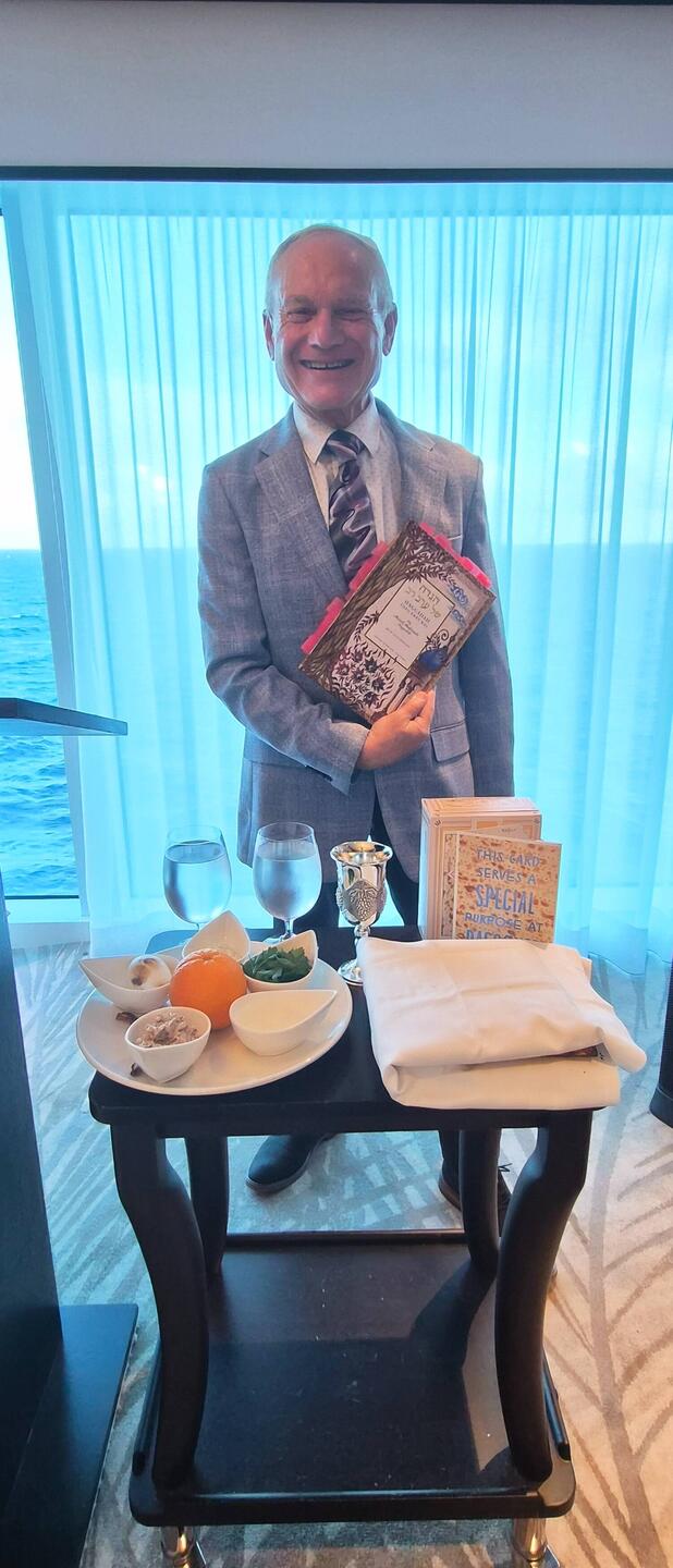 Setup for Night #2, Podium with mics & table with necessary items (including matzo I got in Tahiti)