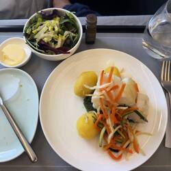 Main course on CX292. The cod was perfectly cooked and wonderfully flaky.