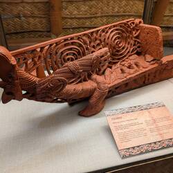The prow from the front of a traditional Maori boat in the Maritime Museum