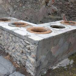 Local food was served from the pots on the marble counter