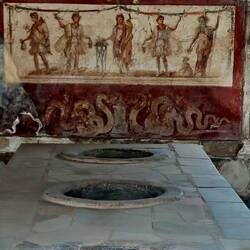 Thermopolium of Asellina with food serving counter and fresco