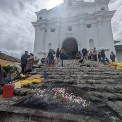 The priest or Shaman just lit some incense before the picture