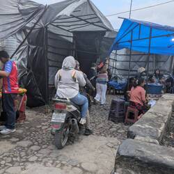 On Saturday, this guy HAD to go through the market on his motor. Which obviously didn't work...