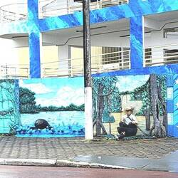 Murals outside the blue side of the stadium.