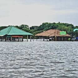 Scenes along the boat ride; bars that operate when the water is lower.
