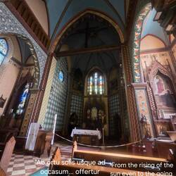 It's our first entry into a Catholic Church. The writing in the arch is inserted into the photo