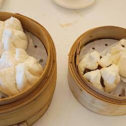 Cha shu bao (steamed BBQ pork buns})