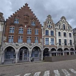 The oldest house in Place des Héros dates back to 1467 (the red brick building)