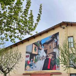 Hinweis in Villanueva auf das Fest "Peropalo" in der Fastenzeit mit Umzügen und Puppenverbrennungen