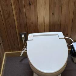 This is an Out House with a heated seat