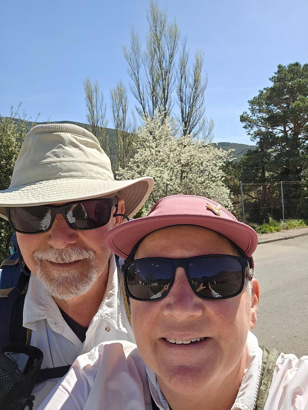Beginning our walk. Plum tree in bloom behind us.