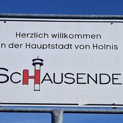 Ortseingangsschild mit Leuchtturm👍