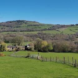 Farmhouse nestled in the valley