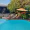 Unsere Lodge mit Pool und Zimmer mit Meerblick