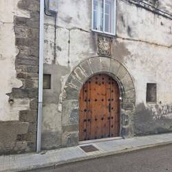 A cool doorway with a crest above