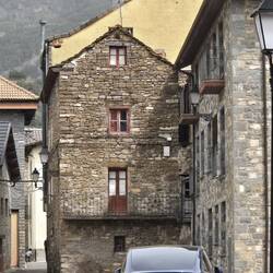 Old restored house next to new construction.