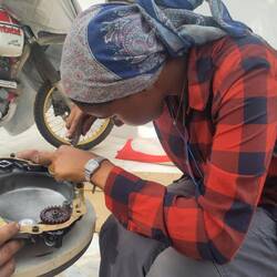 RidingKismet, our master cutter, creating a new clutch cover gasket. She cuts gaskets for anything.