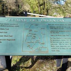 Towpath board detailing different areas of the Peak District providing different mined products