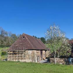 Looking across to the barn - the scaffolding has been there a while we're guessing!