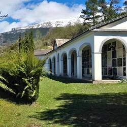 The cemetery is up above the city. A nice view of the mountains.