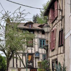 Windows square and not so square, leaning and still intact