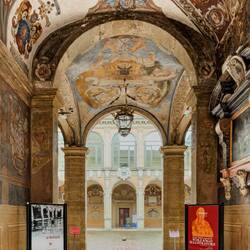 View toward the courtyard from just inside the entrance to Palazzo dell'Archiginnasio — Bologna.
