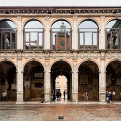 View across the courtyard towards the entrance — Palazzo dell'Archiginnasio.