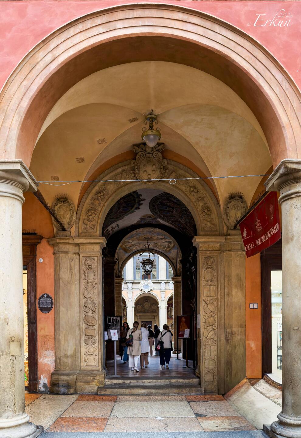 Entrance to Palazzo dell'Archiginnasio from Piazza Galvani — Bologna, Italy.