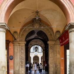 Entrance to Palazzo dell'Archiginnasio from Piazza Galvani — Bologna, Italy.
