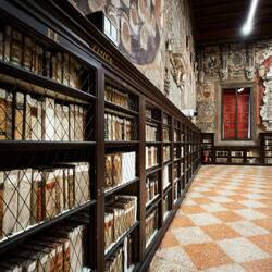 Some of the bookcases rimming the Stabat Mater Hall ... in the foreground are physics books.