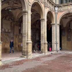 The double-arcaded loggia around the courtyard held classrooms and the chapel — Archiginnasio.