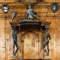 "Skinned men" statues and the allegory of anatomy receiving a femur from a putto — Teatro Anatomico.