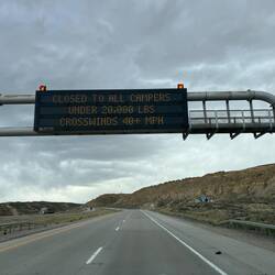 This sign was west of Elk Mountain. Same warning in the Laramie Mountains, but for High Profile...