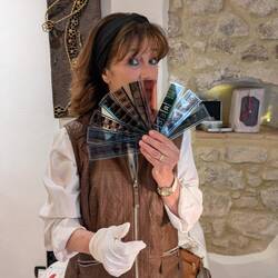 Showing off her handmade items from cinematic reels from the studio she worked for
