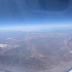View from my window on the plane. There's water in the distance.