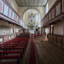 A female priest travels to 16 nearby towns to conduct services. So this church has a service monthly