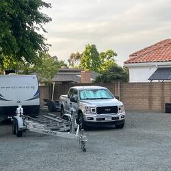 Rig safely tucked away in the marina's maintenance lot.
