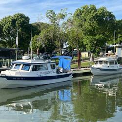 C-Traveler and Sea-Spray tied up to the dock at the Delta Marina.