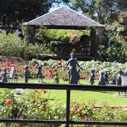 Imelda Roche and grandchildren in the rose garden