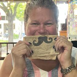 Rosanne having fun with the napkin.